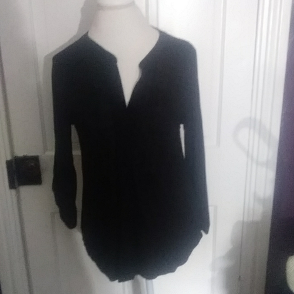Very flattering black viscose and spandex blouse